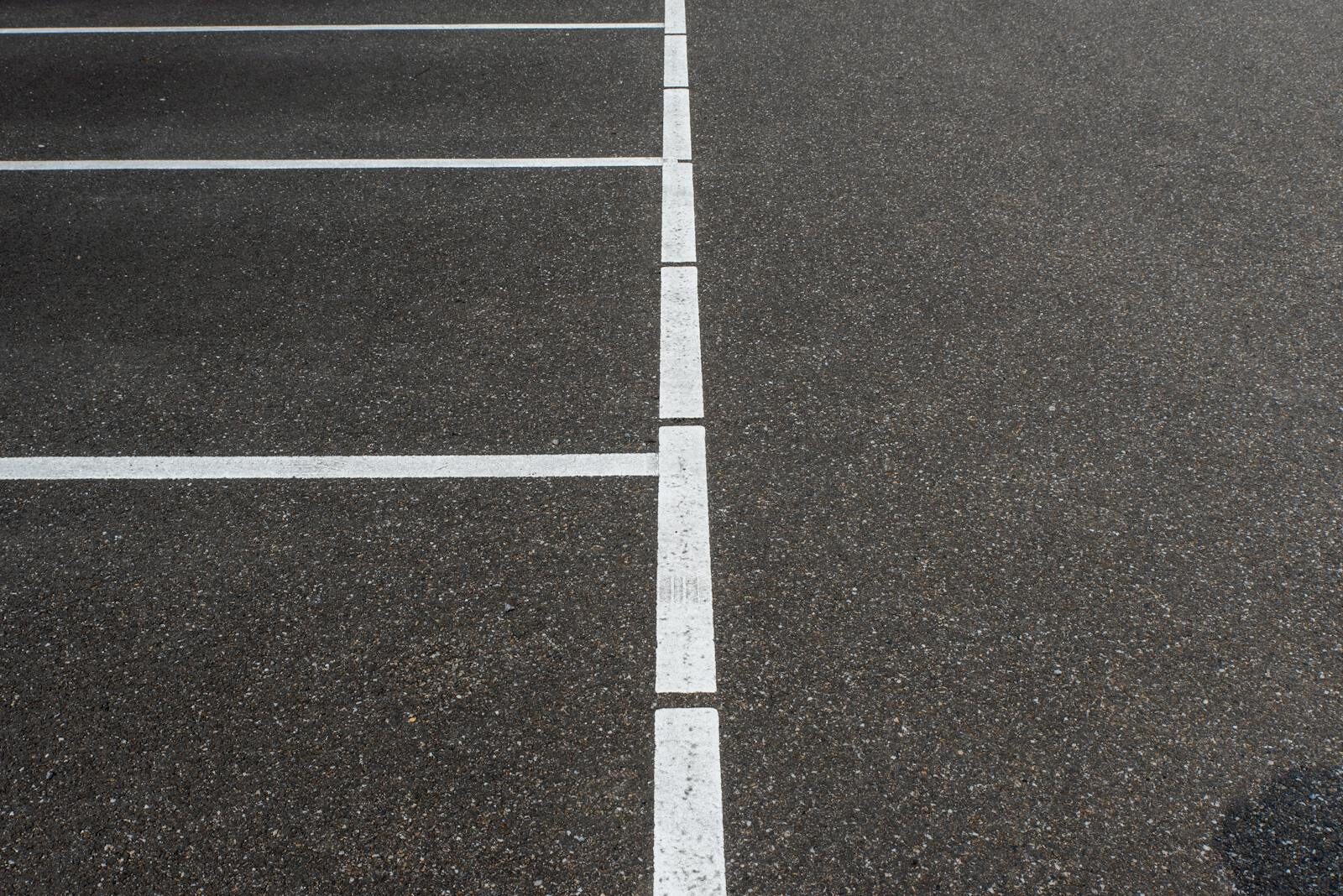 Asphalt carpark β speed-hump installation context