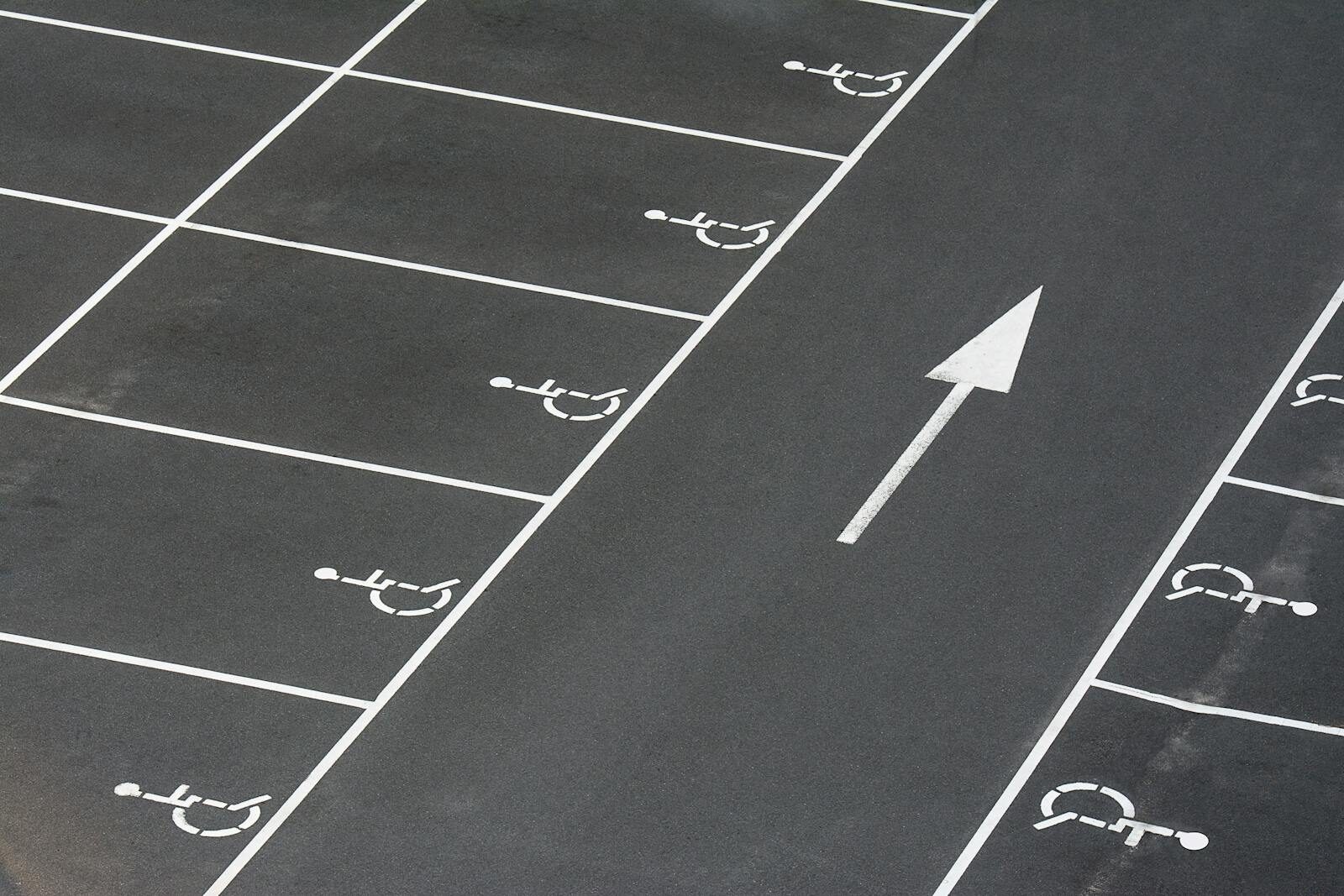 Line marking stencils on commercial carpark